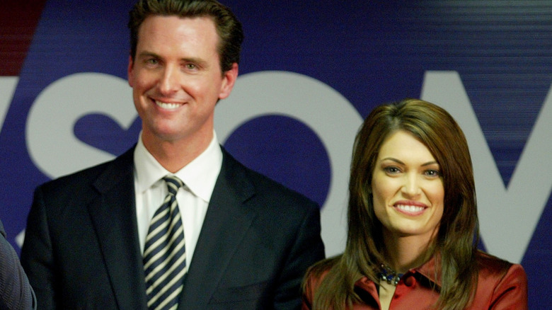 Gavin Newsom and Kimberly Guilfoyle attend an event in the early 2000s