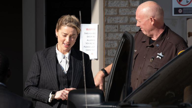 Amber Heard stepping outside of court