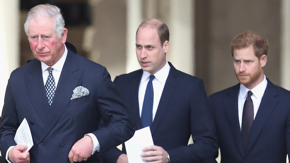 Prince Charles, Prince William, and Prince Harry at an event