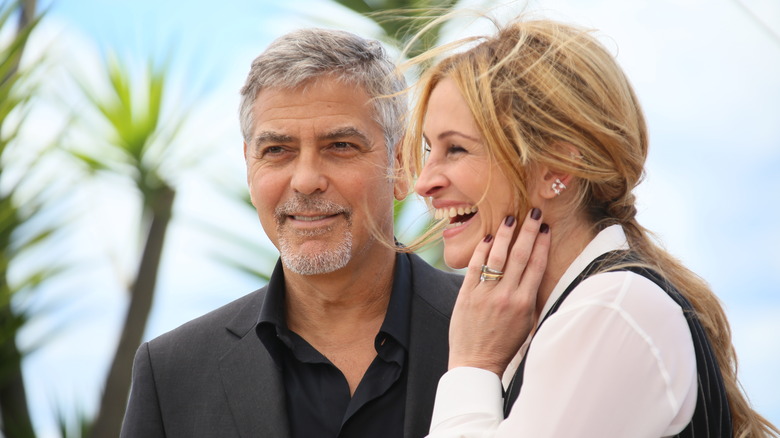 George Clooney and Julia Roberts laughing in 2016