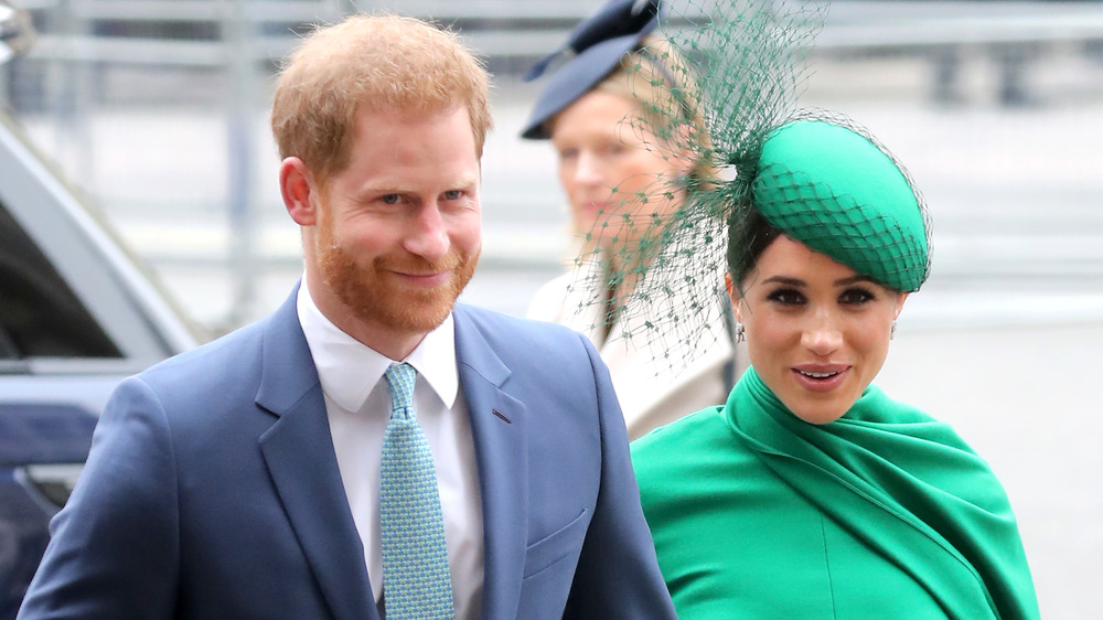 Prince Harry and Meghan Markle walking