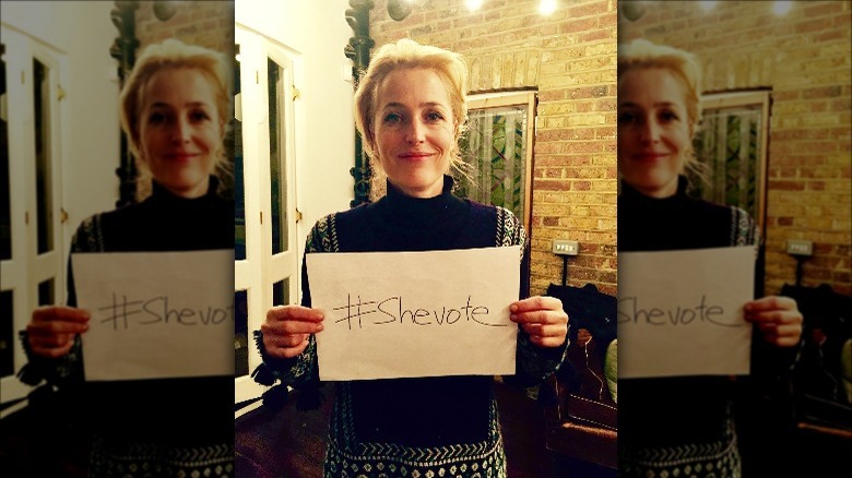 Gillian Anderson with #shevotes sign