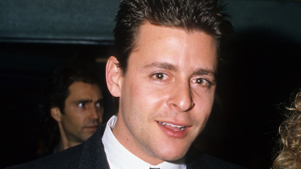 young Judd Nelson smiling