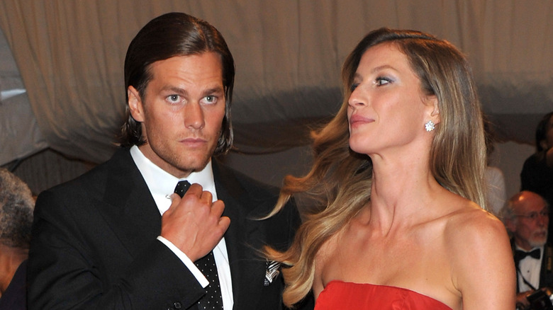 Tom Brady long hair Gisele Bündchen red dress