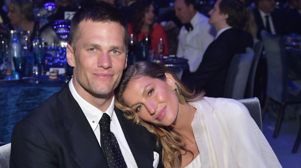 Tom Brady and Gisele Bündchen posing