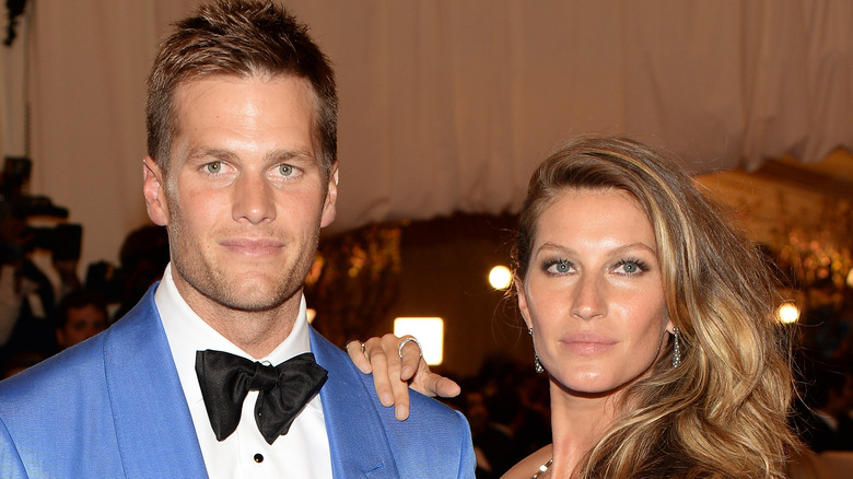 Tom Brady and Gisele Bundchen at an event 