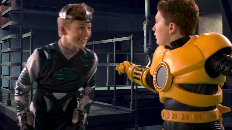 Glen Powell in scene from Spy Kids