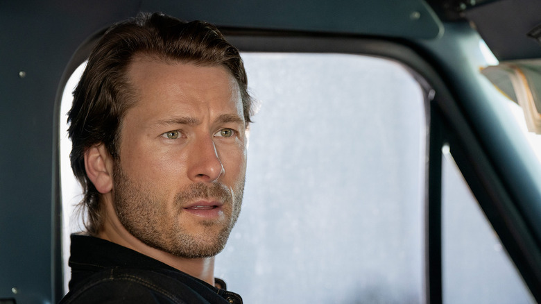 Glen Powell in a scene from Hit Man