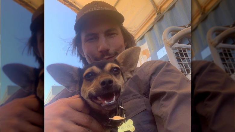 Parker Schnabel posing with dog