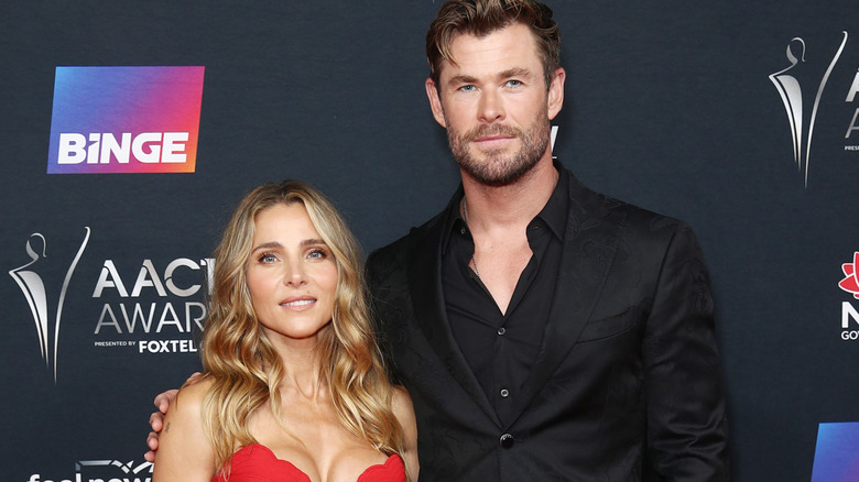 Chris Hemsworth and Elsa Pataky posing for pictures