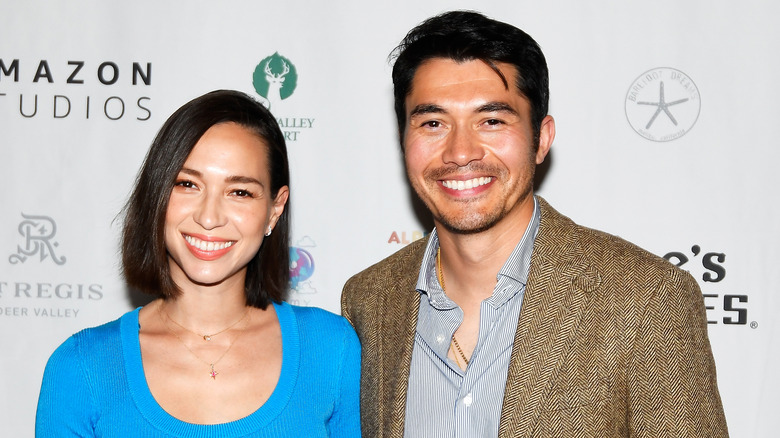 Henry Golding and Liv Lo smiling