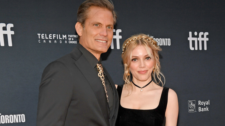 Grace Van Dien posing with her father, Casper Van Dien