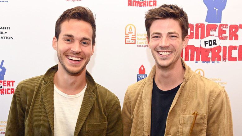 Chris Wood and Grant Gustin grinning