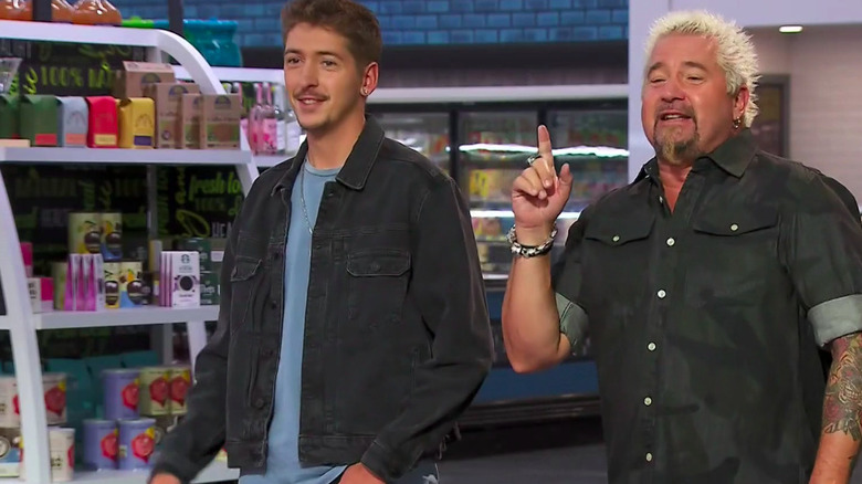 Guy Fieri and Hunter Fieri observing