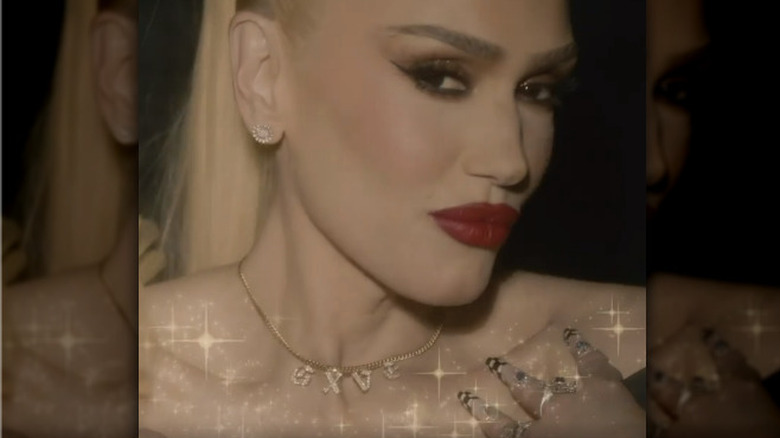 Gwen Stefani wearing GXVE necklace