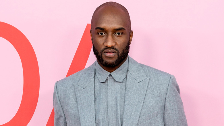 Virgil Abloh posing in gray