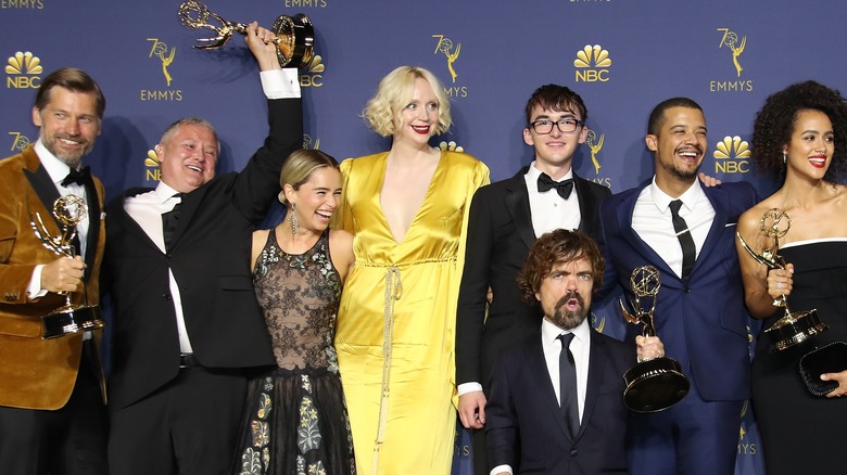 Gwendoline Christie poses with castmembers