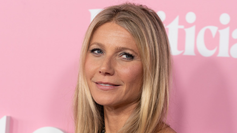 Gwyneth Paltrow on red carpet with slight smile