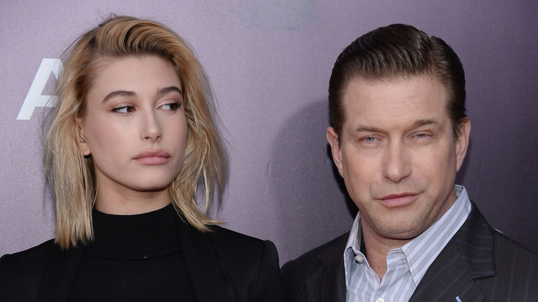 Hailey Bieber and Stephen Baldwin pose 