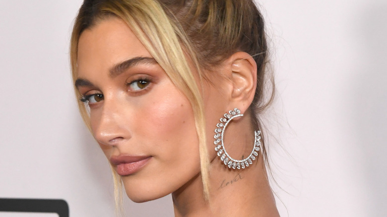 Hailey Bieber Just Revealed the Cutest New YorkInspired Neck Tattoo   Allure