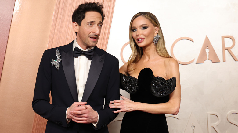 Adrien Brody and Georgina Chapman attends the 97th Annual Oscars at Dolby Theatre