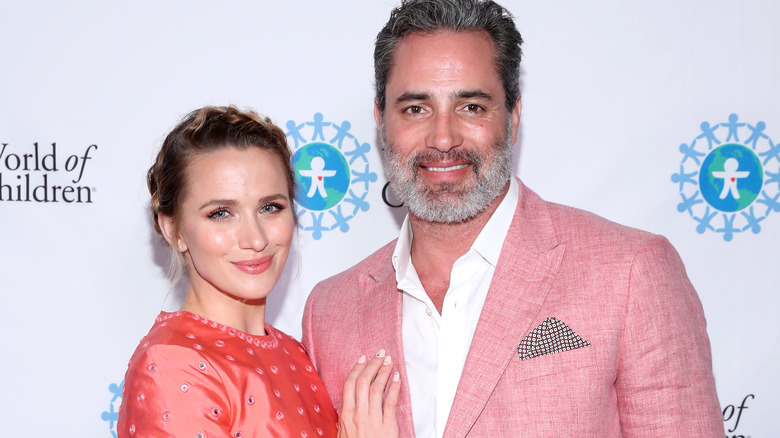 Shantel VanSanten and Victor Webster on a red carpet