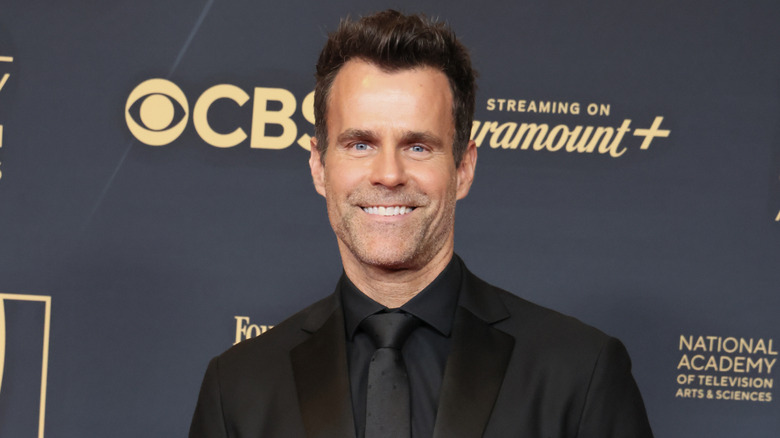 Cameron Mathison wearing all black on the red carpet