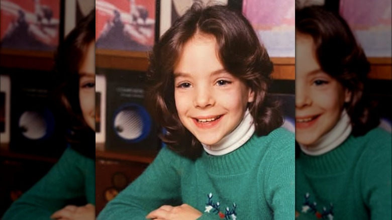 Kimberly Williams-Paisley smiling as a child