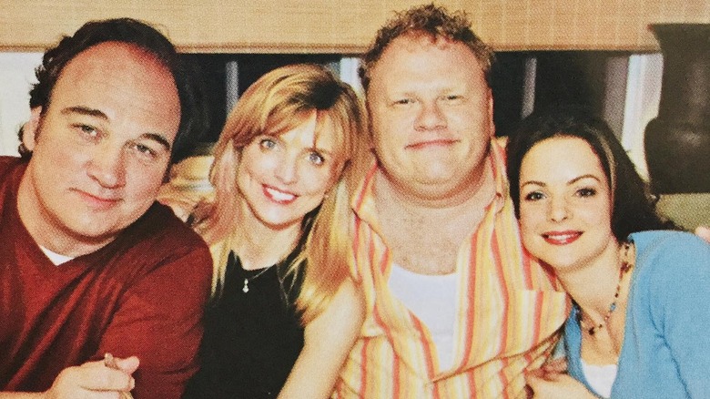 Kimberly Williams-Paisley and her According to Jim co-stars smiling together