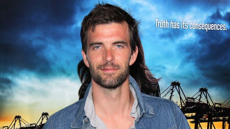 Lucas Bryant posing at an event