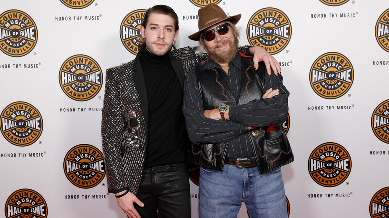 Sam Williams and 2020 inductee Hank Williams Jr. attending the 2021 Medallion Ceremony