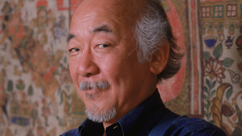 Pat Morita looking toward the camera from the side