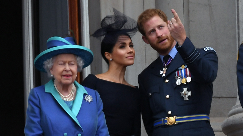 Prince Harry and Meghan Markle with Queen Elizabeth in 2018