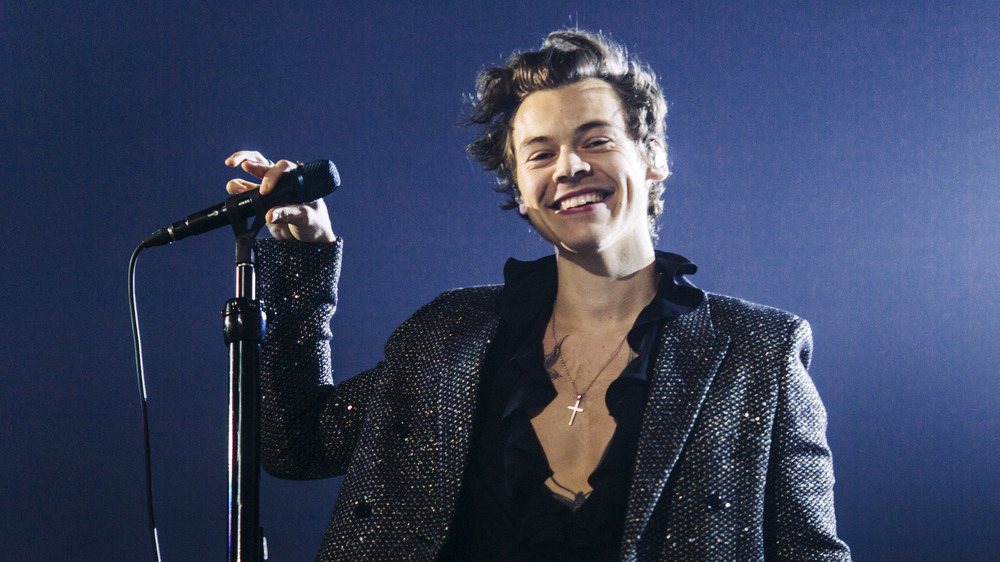 Harry Styles performing in concert