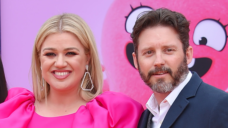 Kelly Clarkson and Brandon Blackstock on the red carpet