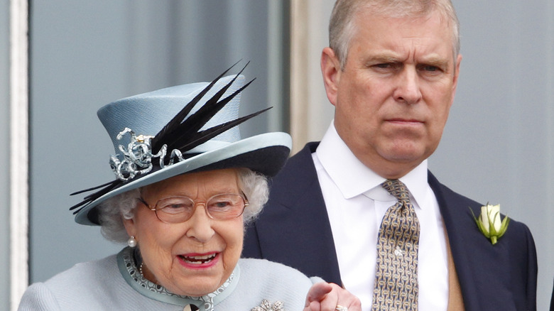 Queen Elizabeth and Prince Andrew smiling