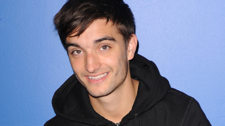 Tom Parker smiling 