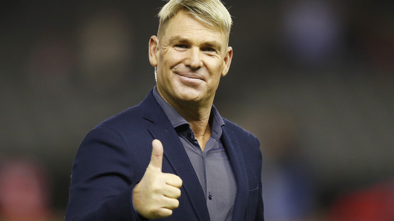 Shane Warne giving a thumbs-up