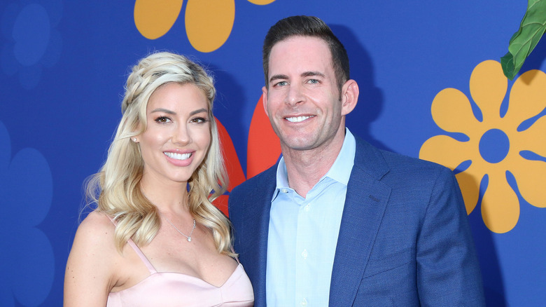 Heather Rae Young and Tarek El Moussa smiling