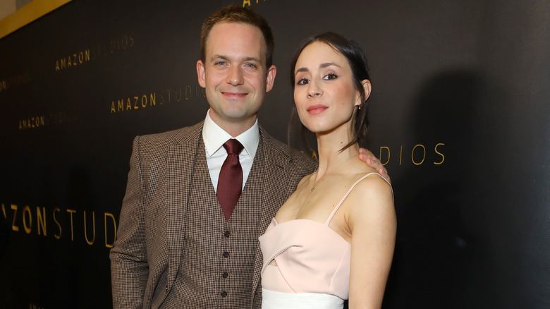 Patrick J. Adams and Troian Bellisario on the red carpet