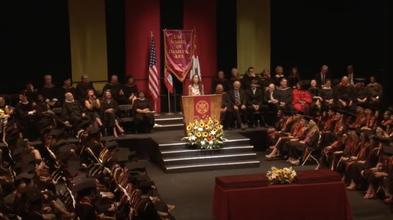 Troian Bellisario giving a commencement speech at USC