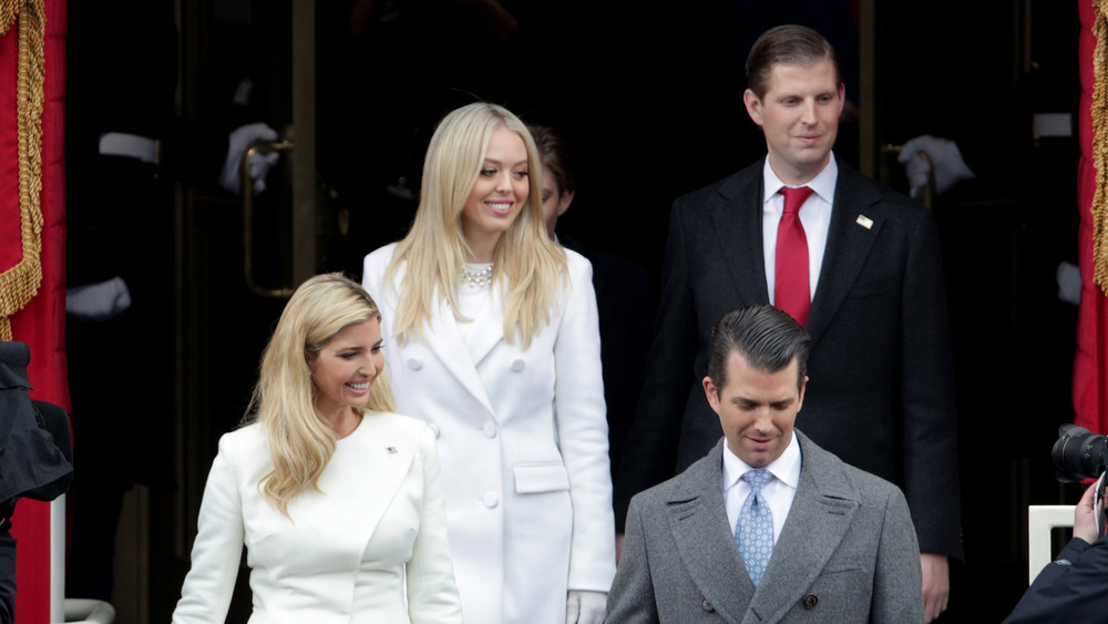 Tiffany, Eric, Ivanka, and Donald Trump Jr. walk down steps together