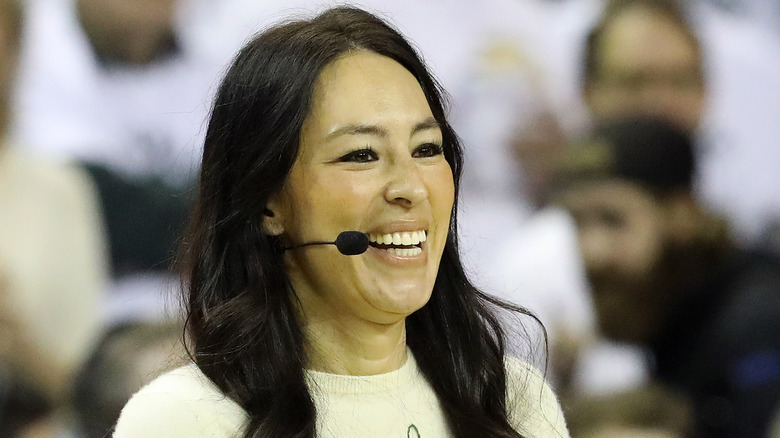 Joanna Gaines with a mic