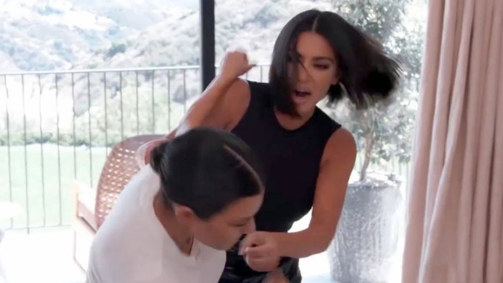 Kim Kardashian and Kourtney Kardashian fighting on KUWTK