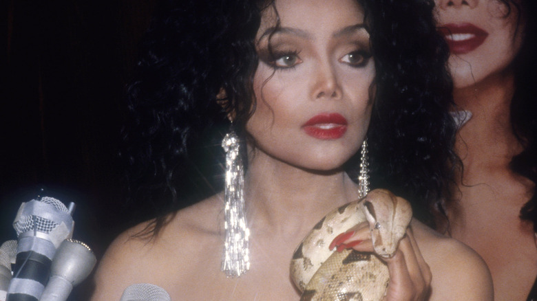 La Toya Jackson poses with a snake