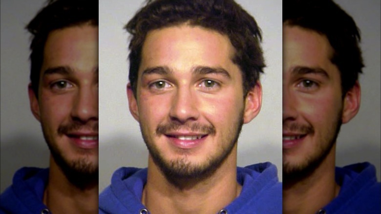 Shia LaBeouf grining mug shot