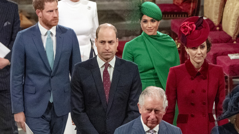 Prince Harry, Prince William, Kate Middleton, Meghan Markle, and Prince William standing 