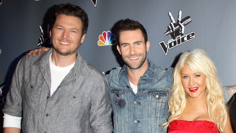 Adam Levine with Blake Shelton and Christina Aguilera promoting "The Voice"