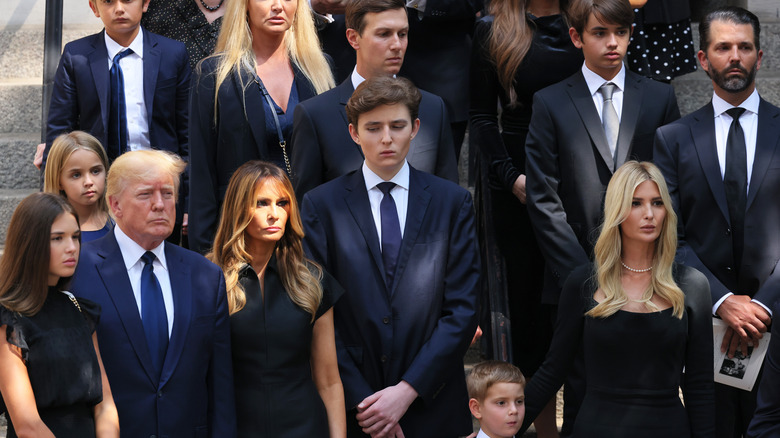 Barron Trump with family