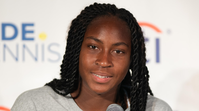 Coco Gauff speaking at a press conference